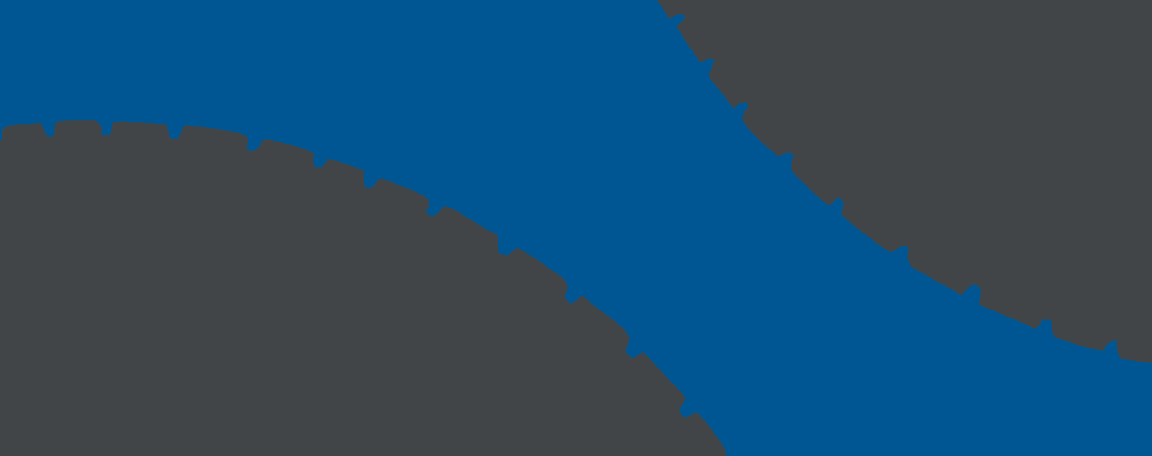 Abstract decorative banner with overlapping wave shapes in navy blue and dark gray, featuring jagged, tread-like edges reminiscent of tire tracks.